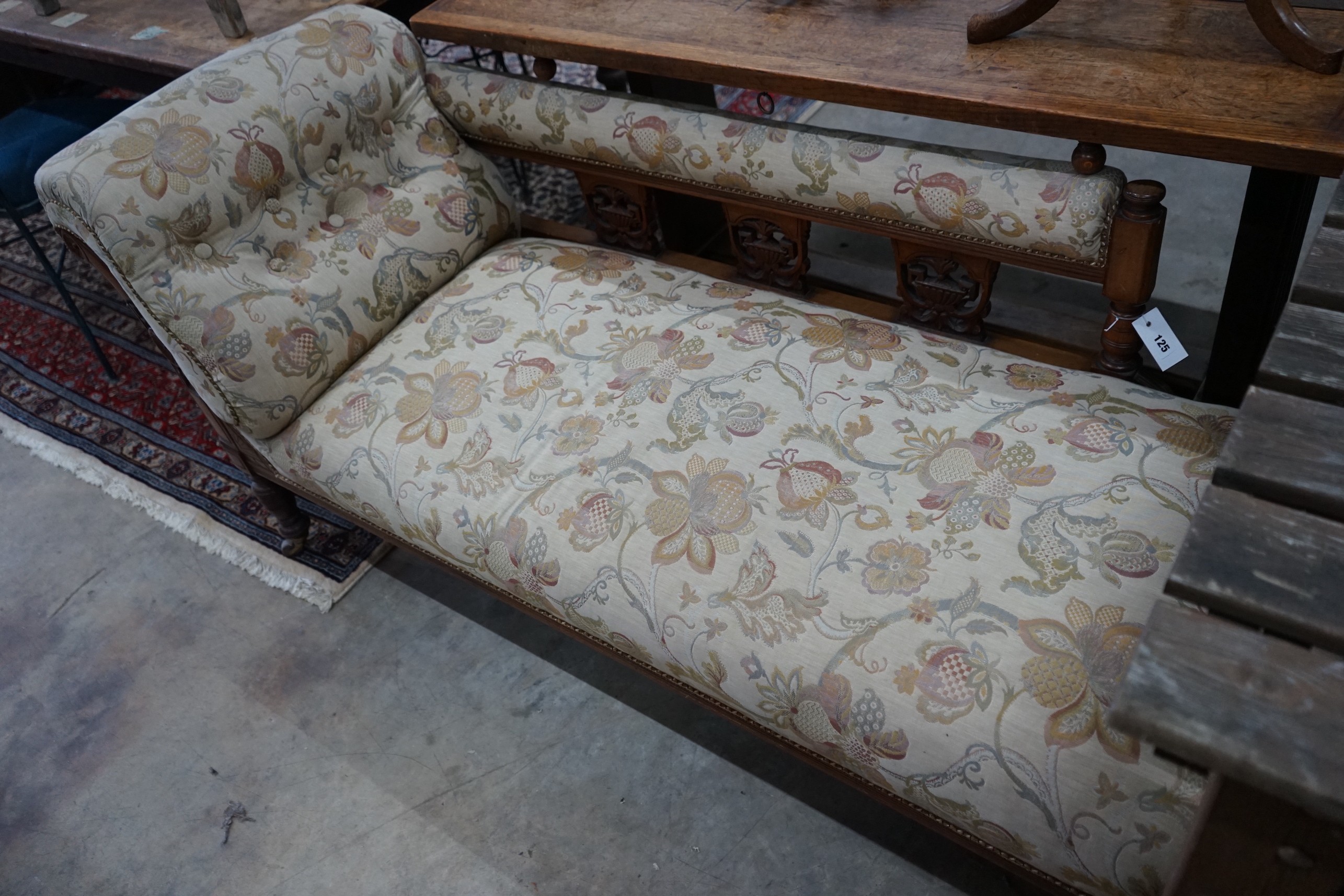 A late Victorian walnut chaise longue, length 176cm, depth 64cm, height